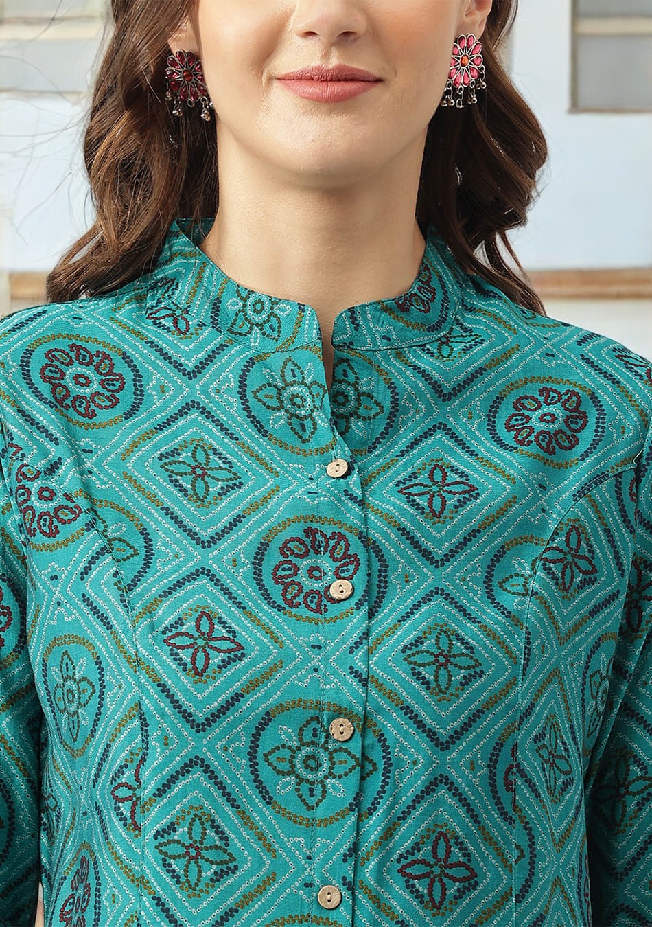 Turquoise Blue Printed Muslin Fold Sleeve top